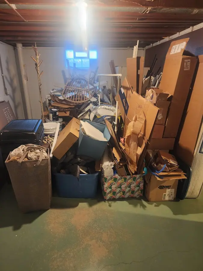 Roll-off dumpster container at job site for 20 Yard Dumpster Rental in Montrose